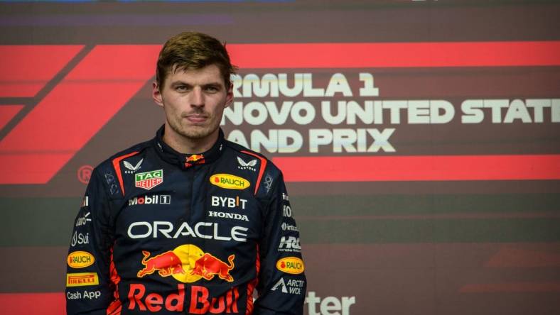 Oct 22, 2023; Austin, Texas, USA; Red Bull Racing Honda driver Max Verstappen (1) of Team Netherlands on podium after the 2023 United States Grand Prix at Circuit of the Americas. Mandatory Credit: Jerome Miron-USA TODAY Sports