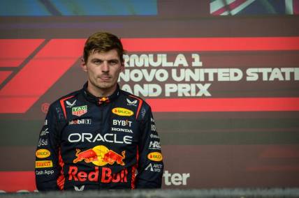 Oct 22, 2023; Austin, Texas, USA; Red Bull Racing Honda driver Max Verstappen (1) of Team Netherlands on podium after the 2023 United States Grand Prix at Circuit of the Americas. Mandatory Credit: Jerome Miron-USA TODAY Sports
