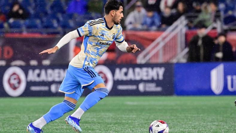 Oct 21, 2023; Foxborough, Massachusetts, USA; Philadelphia Union forward Julian Carranza (9) pushes the ball up field during the first half against the New England Revolution at Gillette Stadium. Mandatory Credit: Eric Canha-USA TODAY Sports