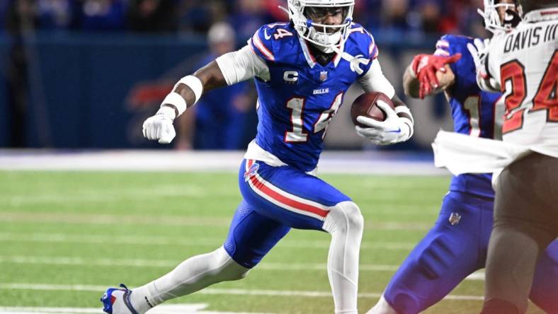 Oct 26, 2023; Orchard Park, New York, USA; Buffalo Bills wide receiver Stefon Diggs (14) runs after making a catch against the Tampa Bay Buccaneers in the fourth quarter at Highmark Stadium. Mandatory Credit: Mark Konezny-USA TODAY Sports