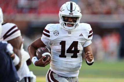 Oct 28, 2023; Auburn, Alabama, USA;  Mississippi State Bulldogs quarterback Mike Wright (14) carries against the Auburn Tigers during the third quarter at Jordan-Hare Stadium. Mandatory Credit: John Reed-USA TODAY Sports