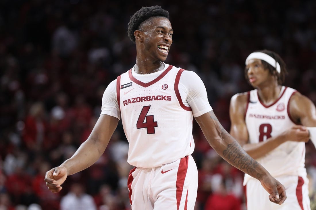 Oct 28, 2023; Fayetteville, AR, USA; Arkansas Razorbacks guard Davonte Davis (4) celebrates during the second half against the Purdue Boilermakers at Bud Walton Arena. Arkansas won 81-77. Mandatory Credit: Nelson Chenault-USA TODAY Sports