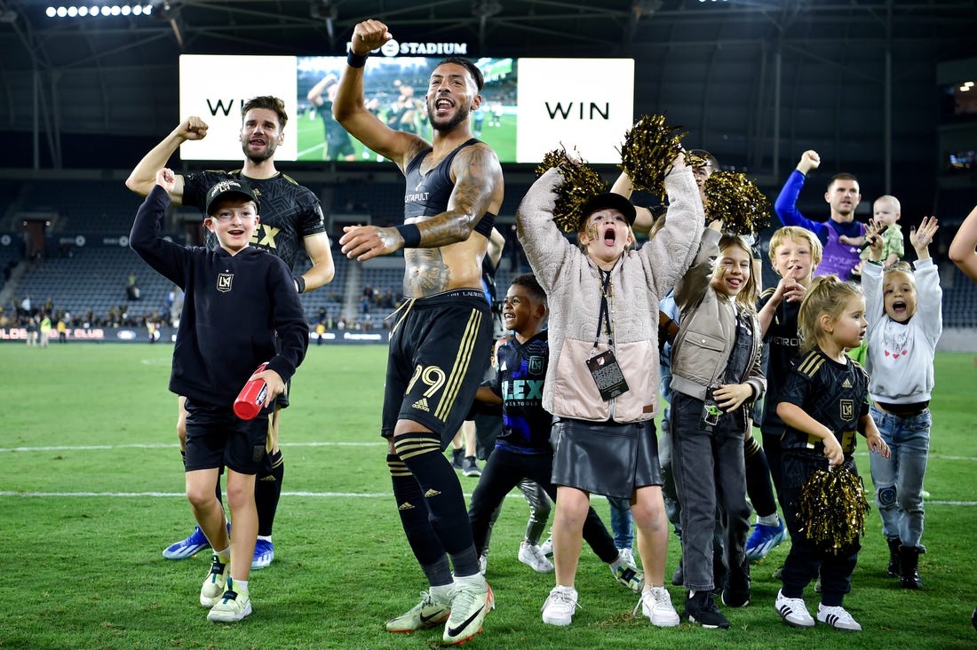 Oct 28, 2023; Los Angeles, CA, USA; Los Angeles FC forward Denis Bouanga (99) celebrates on the field after the match against the Vancouver Whitecaps FC in game one in a round one match of the 2023 MLS Cup Playoffs at BMO Stadium. Mandatory Credit: Jon Durr-USA TODAY Sports