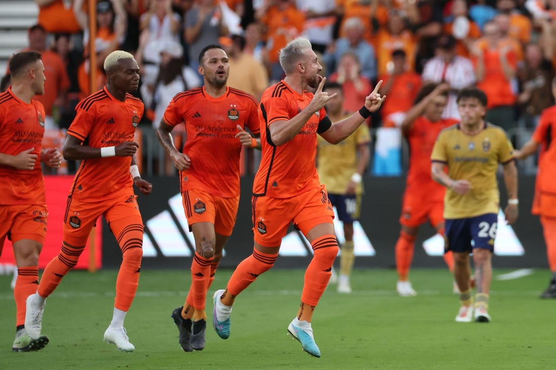 Oct 29, 2023; Houston, TX, USA; Houston Dynamo midfielder Hector Herrera (16) reacts after scoring a goal against Real Salt Lake game one in a round one match of the 2023 MLS Cup Playoffs at Shell Energy Stadium. Mandatory Credit: Thomas Shea-USA TODAY Sports