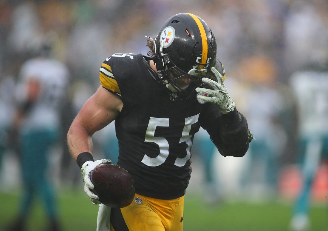 Pittsburgh Steelers Cole Holcomb pulls dirt out of his helmet after recovering a fumble during the first half against the Jacksonville Jaguars at Acrisure Stadium in Pittsburgh, PA on October 29, 2023.