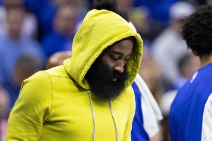 Oct 29, 2023; Philadelphia, Pennsylvania, USA; Philadelphia 76ers guard James Harden in plain clothes on the bench during the second quarter of a game against the Portland Trail Blazers at Wells Fargo Center. Mandatory Credit: Bill Streicher-USA TODAY Sports