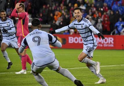 Oct 29, 2023; St. Louis, MO, USA; Sporting Kansas City forward Daniel Salloi (20) celebrates after a goal during the second half of game one in a round one match of the 2023 MLS Cup Playoffs against St. Louis City at CITYPARK. Mandatory Credit: Joe Puetz-USA TODAY Sports