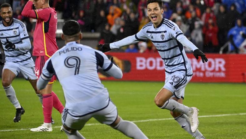 Oct 29, 2023; St. Louis, MO, USA; Sporting Kansas City forward Daniel Salloi (20) celebrates after a goal during the second half of game one in a round one match of the 2023 MLS Cup Playoffs against St. Louis City at CITYPARK. Mandatory Credit: Joe Puetz-USA TODAY Sports