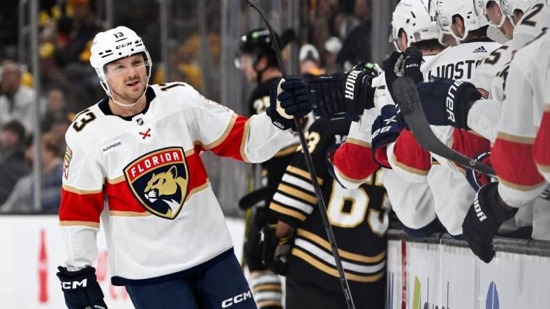 Oct 30, 2023; Boston, Massachusetts, USA; Florida Panthers center Sam Reinhart (13) celebrates with his teammates after scoring a goal against the Boston Bruins during the first period at the TD Garden. Mandatory Credit: Brian Fluharty-USA TODAY Sports