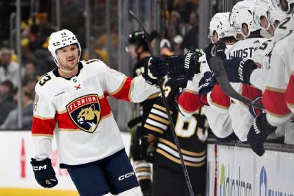 Oct 30, 2023; Boston, Massachusetts, USA; Florida Panthers center Sam Reinhart (13) celebrates with his teammates after scoring a goal against the Boston Bruins during the first period at the TD Garden. Mandatory Credit: Brian Fluharty-USA TODAY Sports
