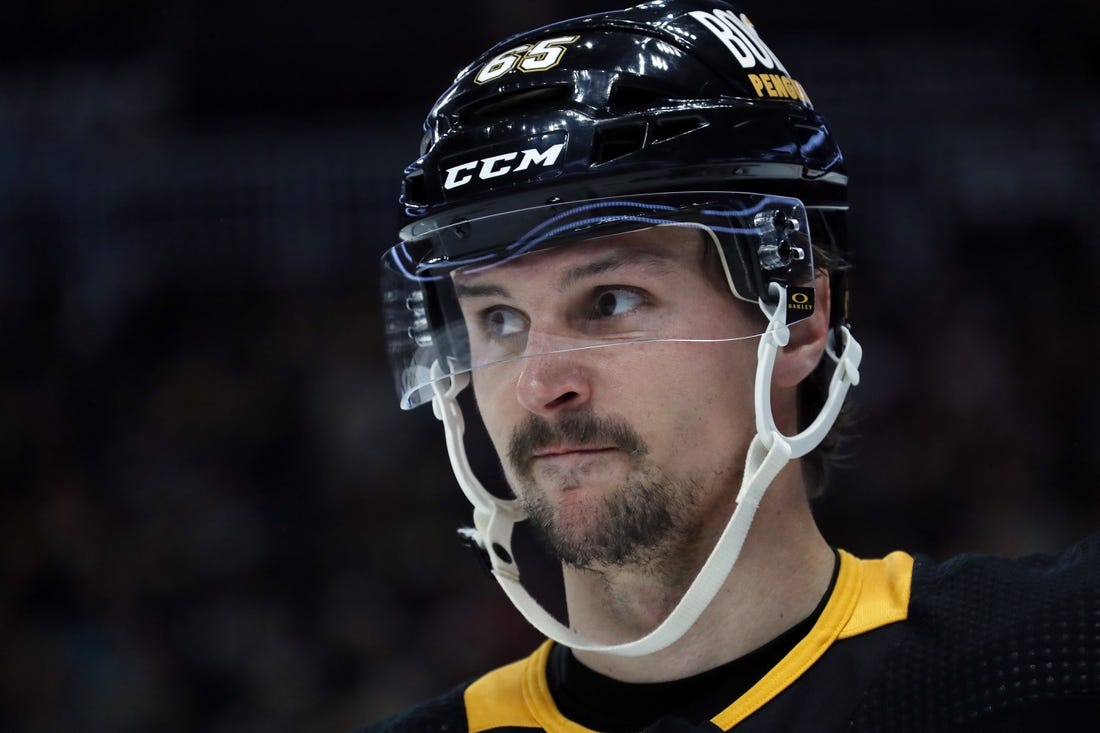 Oct 30, 2023; Pittsburgh, Pennsylvania, USA;  Pittsburgh Penguins defenseman Erik Karlsson (65) looks on against the Anaheim Ducks during the third period at PPG Paints Arena. Anaheim won 4-3. Mandatory Credit: Charles LeClaire-USA TODAY Sports