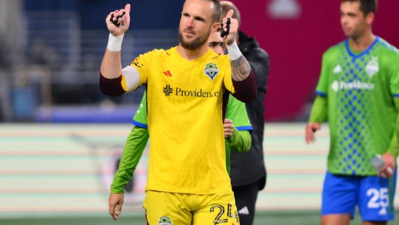 Oct 30, 2023; Seattle, Washington, USA; Seattle Sounders FC goalkeeper Stefan Frei (24) applauds after defeating FC Dallas in game one of a round one match of the 2023 MLS Cup Playoffs at Lumen Field. Mandatory Credit: Steven Bisig-USA TODAY Sports