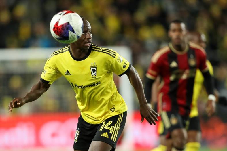 Nov 1, 2023; Columbus, Ohio, USA;Columbus Crew midfielder Yaw Yeboah (14) pursues the ball during the first half of game one against Atlanta United in a round one match of the 2023 MLS Cup Playoffs at Lower.com Field. Mandatory Credit: Joseph Maiorana-USA TODAY Sports