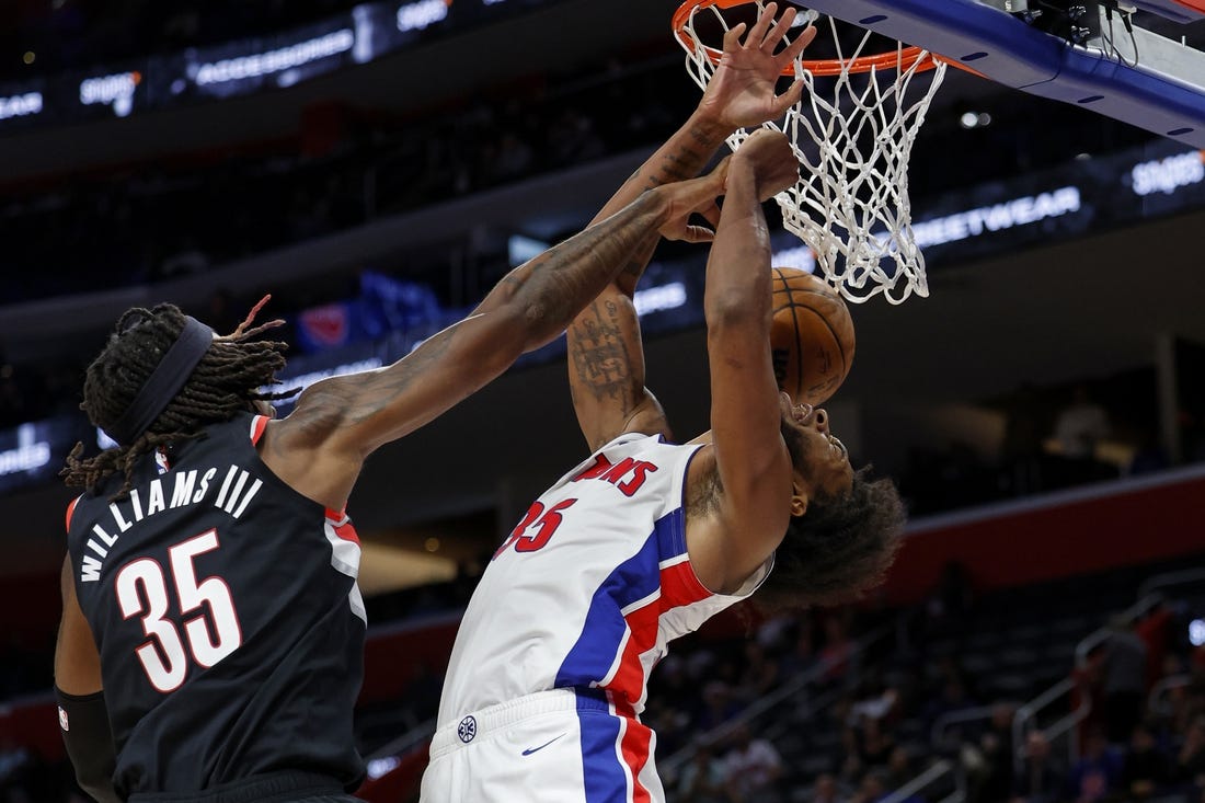 Nov 1, 2023; Detroit, Michigan, USA;  Portland Trail Blazers center Robert Williams III (35) blocks a shot by Detroit Pistons forward Marvin Bagley III (35) in the second half at Little Caesars Arena. Mandatory Credit: Rick Osentoski-USA TODAY Sports