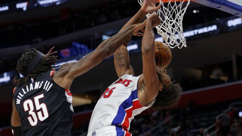 Nov 1, 2023; Detroit, Michigan, USA;  Portland Trail Blazers center Robert Williams III (35) blocks a shot by Detroit Pistons forward Marvin Bagley III (35) in the second half at Little Caesars Arena. Mandatory Credit: Rick Osentoski-USA TODAY Sports