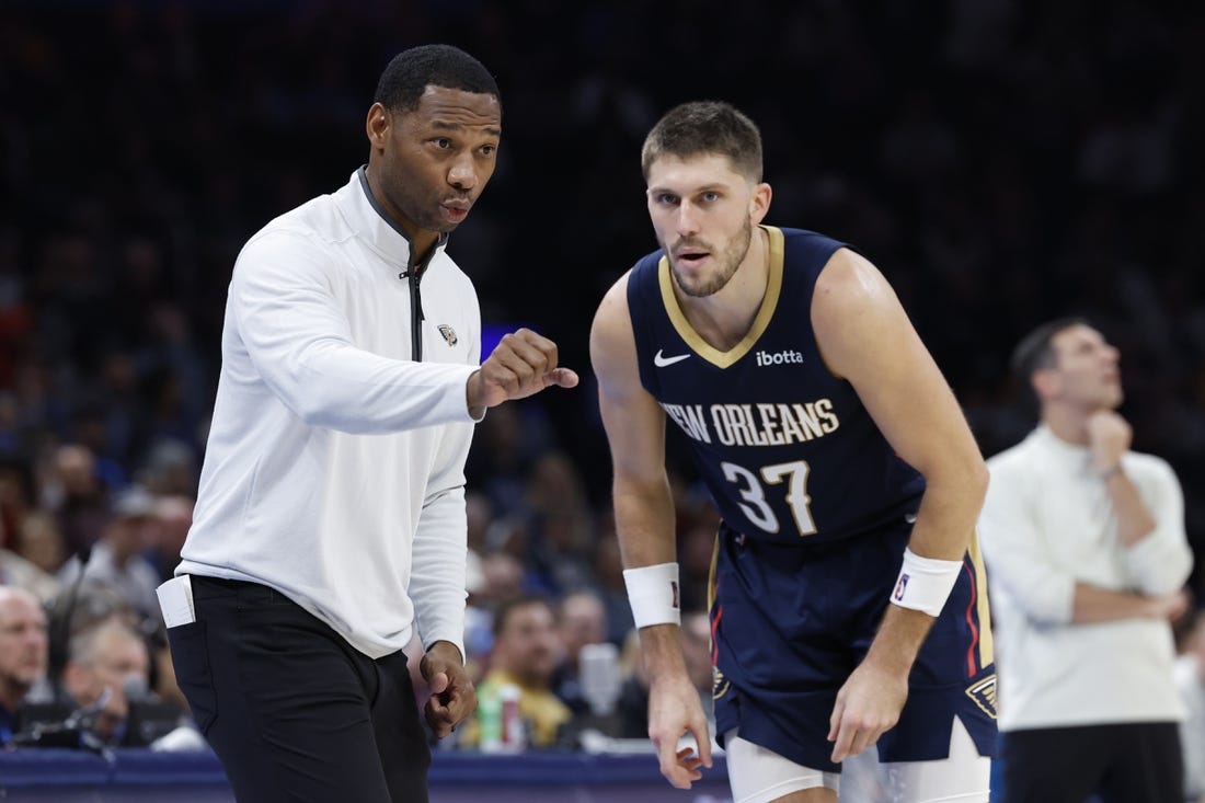 Nov 1, 2023; Oklahoma City, Oklahoma, USA; New Orleans Pelicans head coach Willie Green talks to New Orleans Pelicans forward Matt Ryan (37) between plays against the Oklahoma City Thunder during the second half at Paycom Center. New Orleans won 110-106. Mandatory Credit: Alonzo Adams-USA TODAY Sports