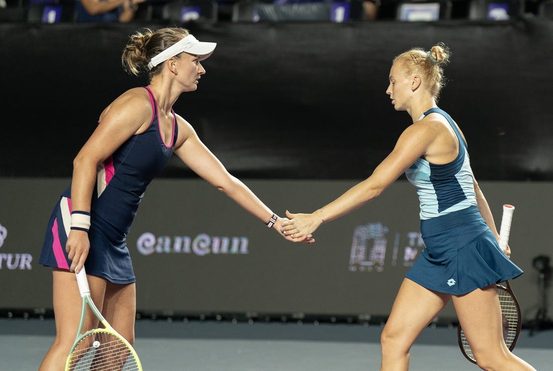 Nov 1, 2023; Cancun, Mexico; Babora Krejcikova (CZE) and Katerina Siniakova (CZE) during their doubles match against Coco Gauff (USA) and Jessica Pegula (USA) on day four of the GNP Saguaros WTA Finals Cancun. Mandatory Credit: Susan Mullane-USA TODAY Sports