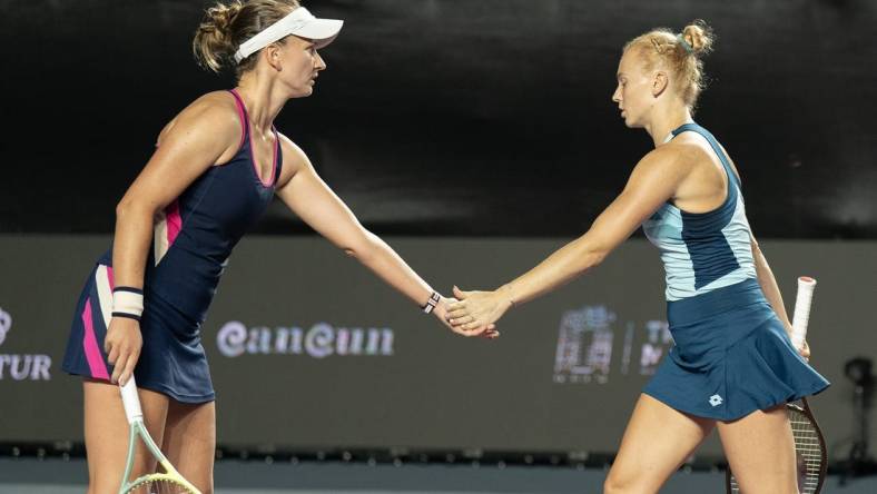 Nov 1, 2023; Cancun, Mexico; Babora Krejcikova (CZE) and Katerina Siniakova (CZE) during their doubles match against Coco Gauff (USA) and Jessica Pegula (USA) on day four of the GNP Saguaros WTA Finals Cancun. Mandatory Credit: Susan Mullane-USA TODAY Sports