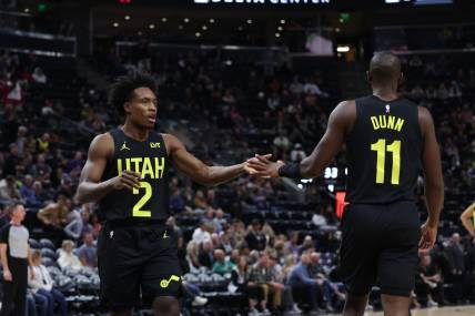 Nov 1, 2023; Salt Lake City, Utah, USA; Utah Jazz guard Collin Sexton (2) and guard Kris Dunn (11) react to the final buzzer in a game against the Memphis Grizzlies at Delta Center. Mandatory Credit: Rob Gray-USA TODAY Sports