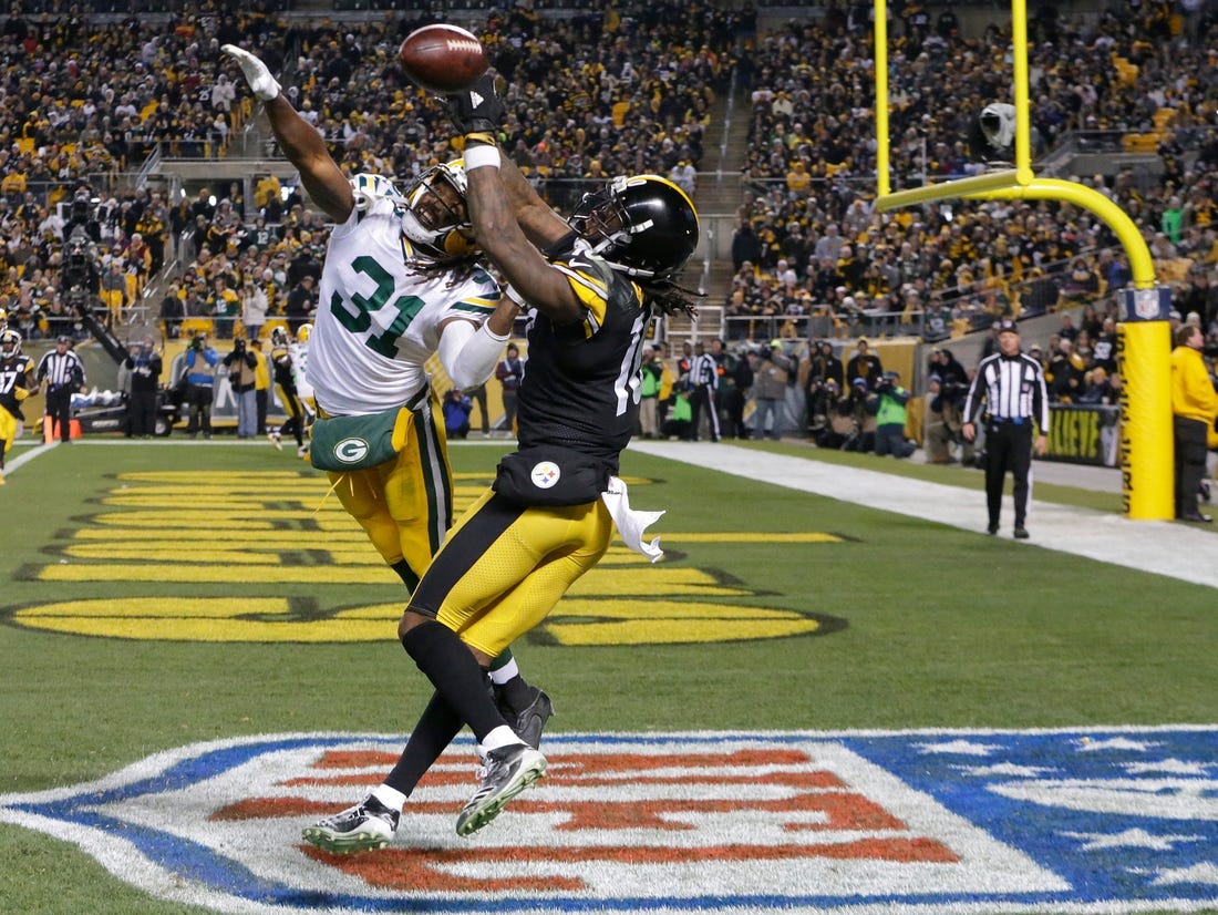 Green Bay Packers cornerback Davon House (31) commits pass interference in the end zone while covering Pittsburgh Steelers wide receiver Martavis Bryant (10) during the third quarter of their game, November 26, 2017 at Heinz Field in Pittsburgh, Pa. The Pittsburgh Steelers beat the Green Bay Packers 31-28 on a field goal as time expired.