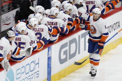 Nov 2, 2023; Washington, District of Columbia, USA; New York Islanders defenseman Ryan Pulock (6) celebrates with teammates after scoring a goal against the Washington Capitals in the first period at Capital One Arena. Mandatory Credit: Geoff Burke-USA TODAY Sports