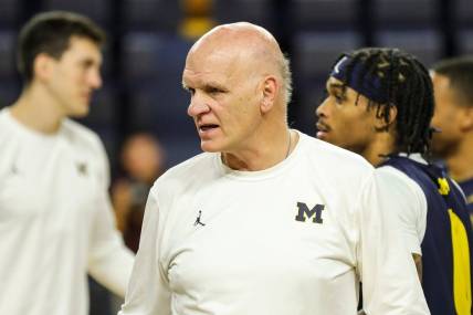 Michigan associate head coach Phil Martelli watches practice during media day at Crisler Center in Ann Arbor on Tuesday, Oct. 17, 2023.