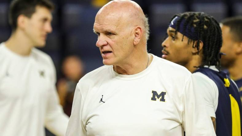 Michigan associate head coach Phil Martelli watches practice during media day at Crisler Center in Ann Arbor on Tuesday, Oct. 17, 2023.