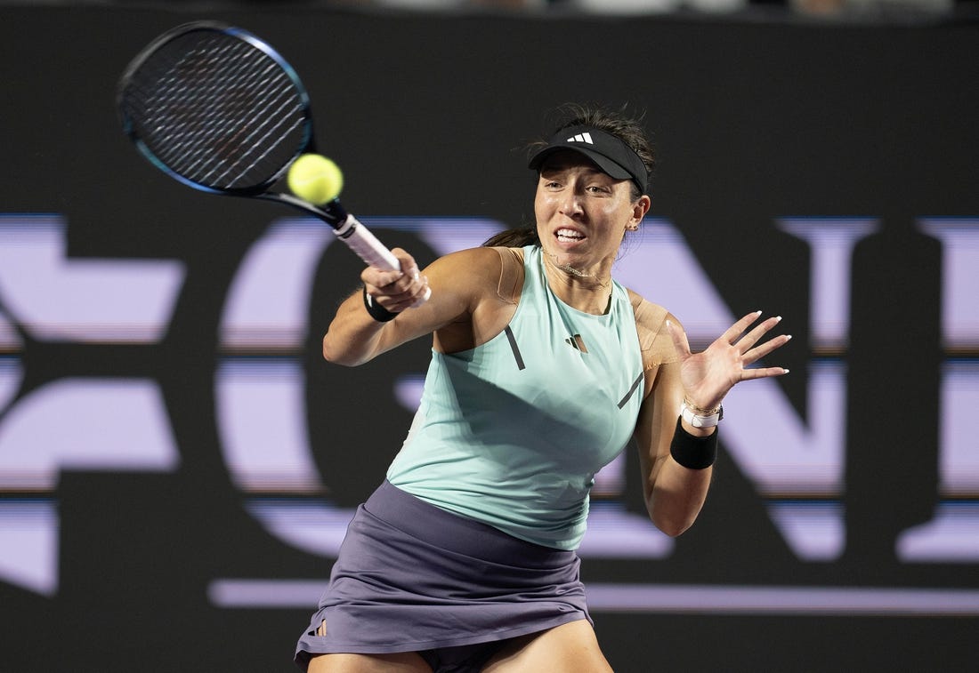 Nov 2, 2023; Cancun, Mexico; Jessica Pegula (USA) returns a shot during her match against Maria Sakkari (GRE) on day five of the GNP Saguaros WTA Finals Cancun. Mandatory Credit: Susan Mullane-USA TODAY Sports