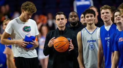 Florida Gators head coach Todd Golden with his team. The Florida men's basketball team held their Orange and Blue Scrimmage at Exactech Arena at the Stephen C. O   Connell Center in Gainesville, FL on Thursday, November 2, 2023. [Doug Engle/Ocala Star Banner]