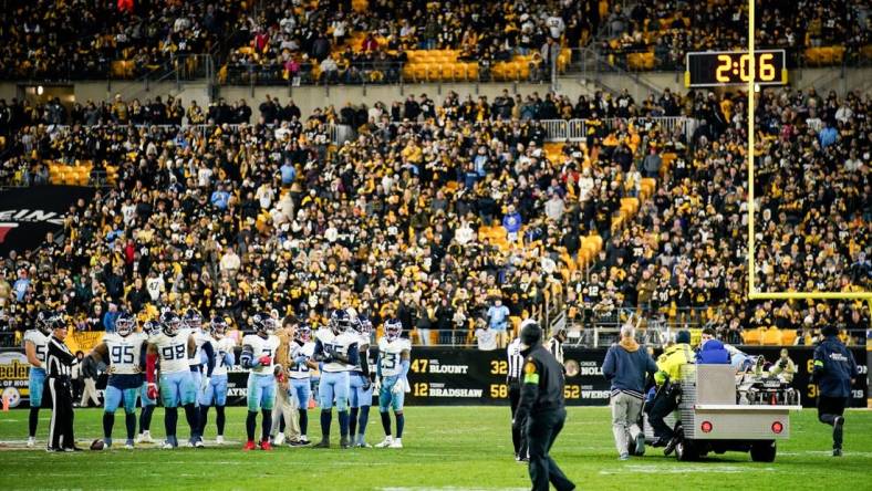 Tennessee Titans players watch at wide receiver Treylon Burks (16) is carted off after an injury during the fourth quarter against the Pittsburgh Steelers in Pittsburgh, Pa., Thursday, Nov. 2, 2023.