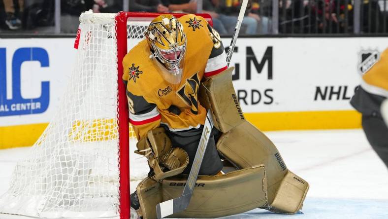 Nov 2, 2023; Las Vegas, Nevada, USA; Vegas Golden Knights goaltender Logan Thompson (36) absorbs a Winnipeg Jets shot during the second period at T-Mobile Arena. Mandatory Credit: Stephen R. Sylvanie-USA TODAY Sports