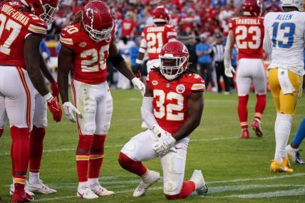 Oct 12, 2023; Kansas City, Missouri, USA; Kansas City Chiefs linebacker Nick Bolton (32) holds his wrist against the Los Angeles Chargers during the game at GEHA Field at Arrowhead Stadium. Mandatory Credit: Denny Medley-USA TODAY Sports