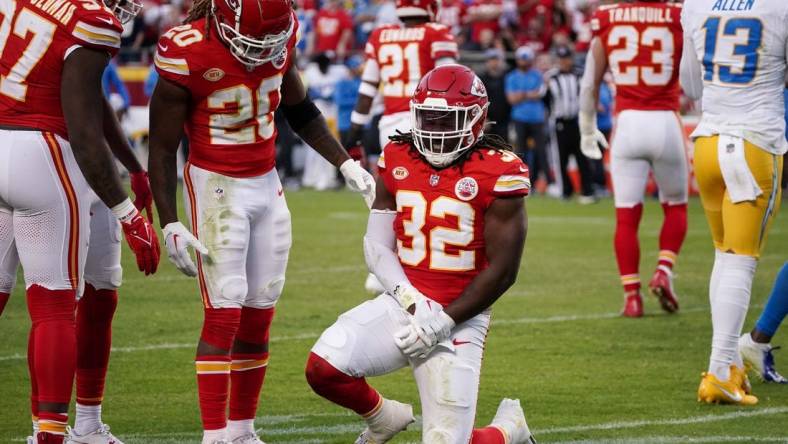 Oct 12, 2023; Kansas City, Missouri, USA; Kansas City Chiefs linebacker Nick Bolton (32) holds his wrist against the Los Angeles Chargers during the game at GEHA Field at Arrowhead Stadium. Mandatory Credit: Denny Medley-USA TODAY Sports