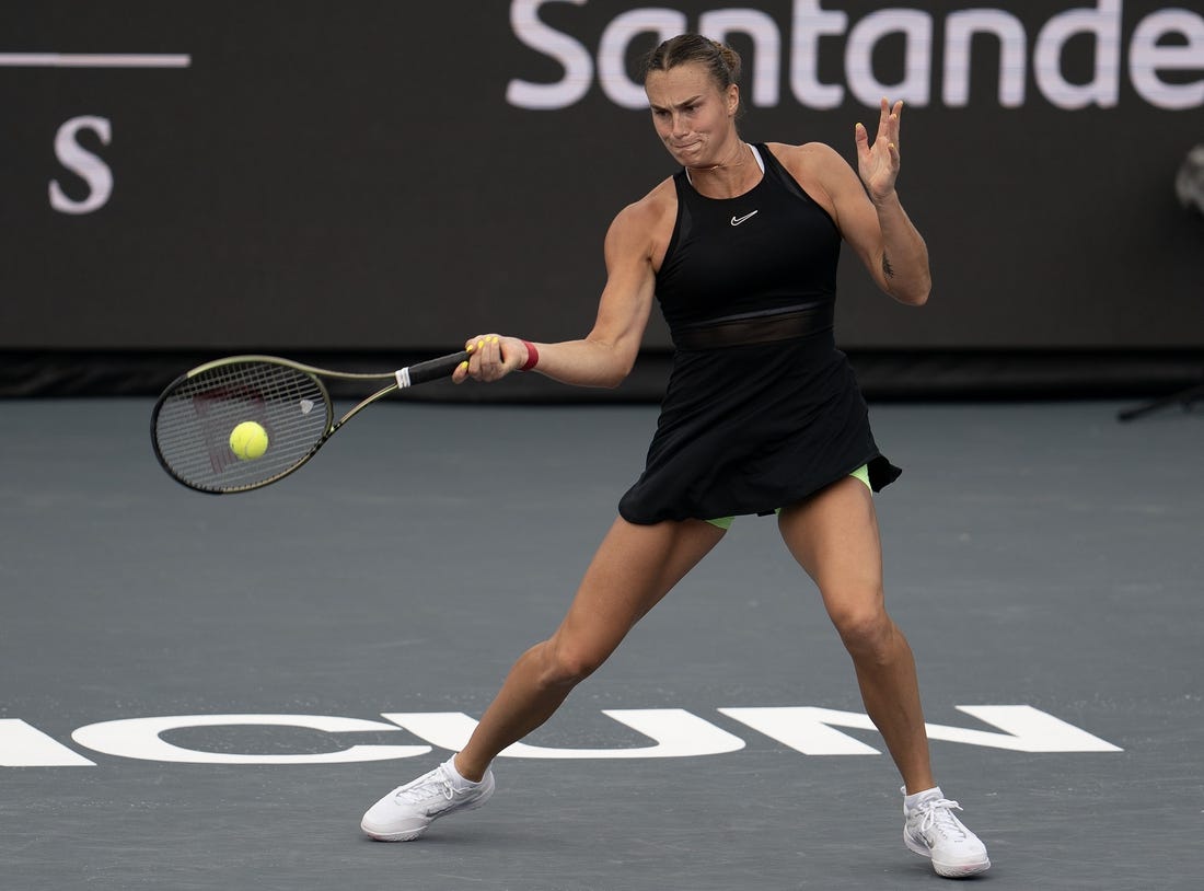 Nov 3, 2023; Cancun, Mexico;  Aryna Sabalenka returns a shot during her match against Elena Rybakina (KAZ) on day six of the GNP Saguaros WTA Finals Cancun. Mandatory Credit: Susan Mullane-USA TODAY Sports