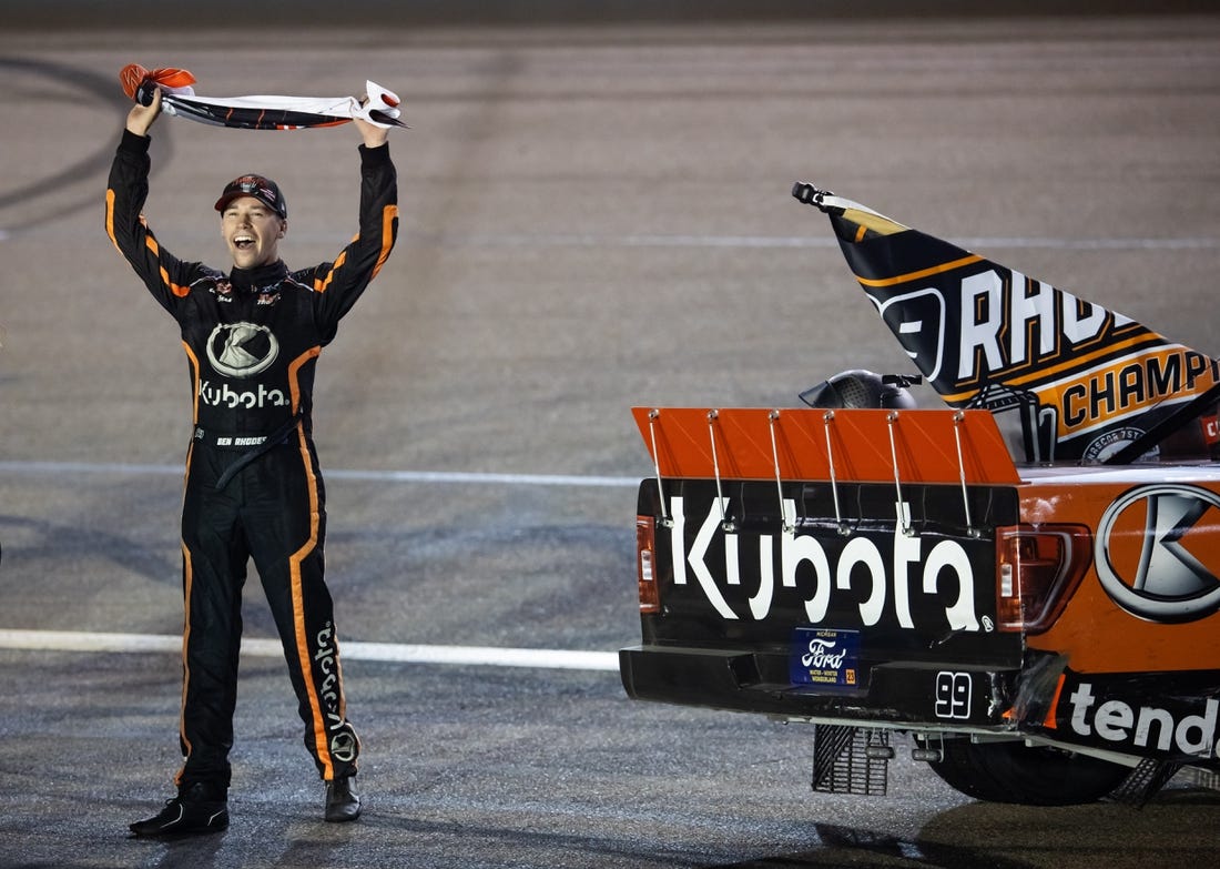 Nov 3, 2023; Avondale, Arizona, USA; NASCAR Truck Series driver Ben Rhodes celebrates after winning the Truck Series Championship during the Championship Race at Phoenix Raceway. Mandatory Credit: Mark J. Rebilas-USA TODAY Sports