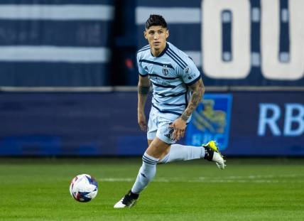 Oct 25, 2023; Kansas City, KS, USA; Sporting Kansas City forward Alan Pulido (9) controls the ball during the second half against the San Jose Earthquakes in the Western Conference Wild Card match of the 2023 MLS Cup Playoffs at Children's Mercy Park. Mandatory Credit: Jay Biggerstaff-USA TODAY Sports