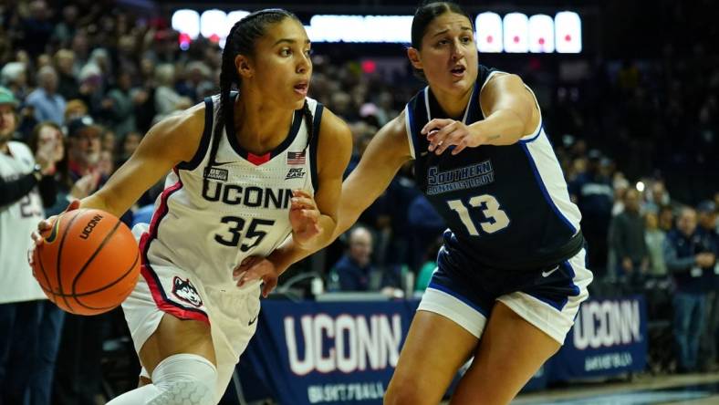 Nov 4, 2023; Storrs, CT, USA; UConn Huskies guard Azzi Fudd (35) drives the ball against Southern Connecticut State University guard Julianna Bonilla (13) in the first half at Gampel Pavillion. Mandatory Credit: David Butler II-USA TODAY Sports