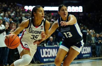 Nov 4, 2023; Storrs, CT, USA; UConn Huskies guard Azzi Fudd (35) drives the ball against Southern Connecticut State University guard Julianna Bonilla (13) in the first half at Gampel Pavillion. Mandatory Credit: David Butler II-USA TODAY Sports