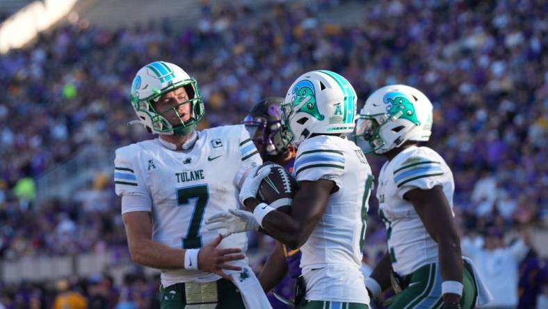 Nov 4, 2023; Greenville, North Carolina, USA; Tulane Green Wave wide receiver Lawrence Keys III (6) is congratulated by quarterback Michael Pratt (7) after his touchdown during the first half at Dowdy-Ficklen Stadium. Mandatory Credit: James Guillory-USA TODAY Sports