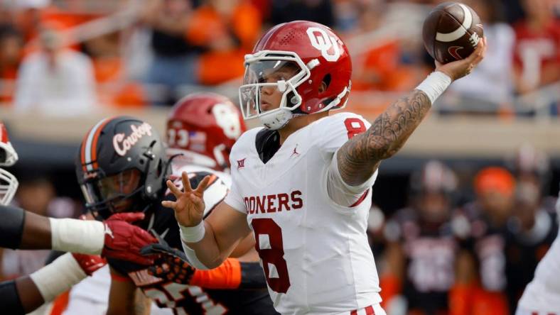 Oklahoma Sooners quarterback Dillon Gabriel (8) throws a pass during a Bedlam college football game between the Oklahoma State University Cowboys (OSU) and the University of Oklahoma Sooners (OU) at Boone Pickens Stadium in Stillwater, Okla., Saturday, Nov. 4, 2023.