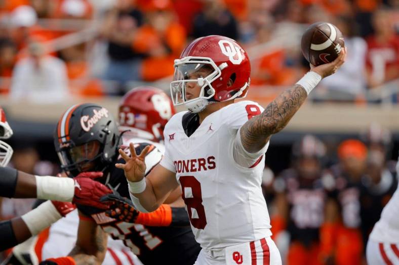 Oklahoma Sooners quarterback Dillon Gabriel (8) throws a pass during a Bedlam college football game between the Oklahoma State University Cowboys (OSU) and the University of Oklahoma Sooners (OU) at Boone Pickens Stadium in Stillwater, Okla., Saturday, Nov. 4, 2023.