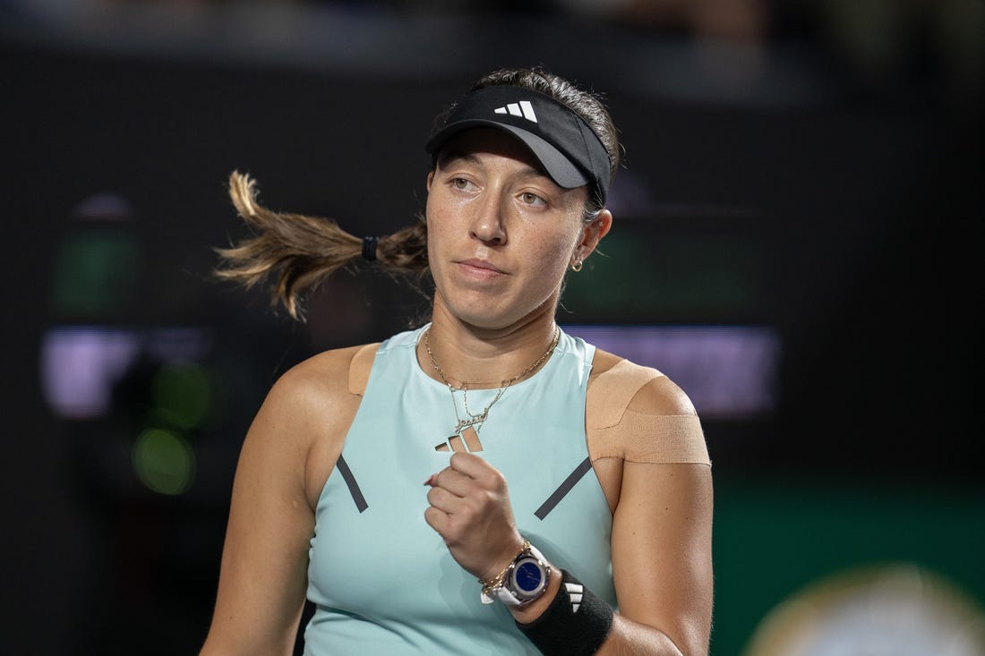 Nov 4, 2023; Cancun, Mexico; Jessica Pegula (USA) celebrates winning her match against Coco Gauff (USA) on day seven of the GNP Saguaros WTA Finals Cancun. Mandatory Credit: Susan Mullane-USA TODAY Sports