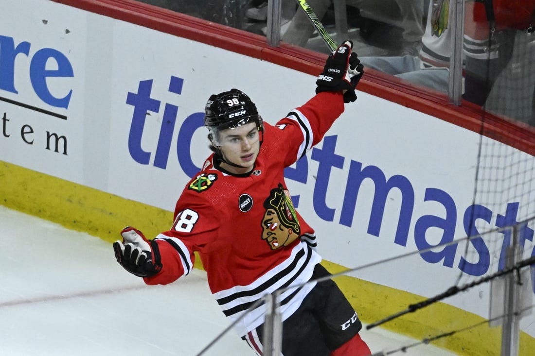 Nov 4, 2023; Chicago, Illinois, USA;  Chicago Blackhawks center Connor Bedard (98) celebrates after he scores a goal against the Florida Panthers during the second period at the United Center. Mandatory Credit: Matt Marton-USA TODAY Sports