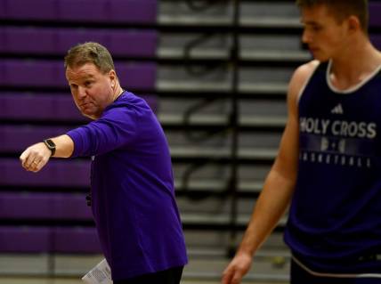 Holy Cross men's basketball coach Dave Paulsen instructs during a recent practice.