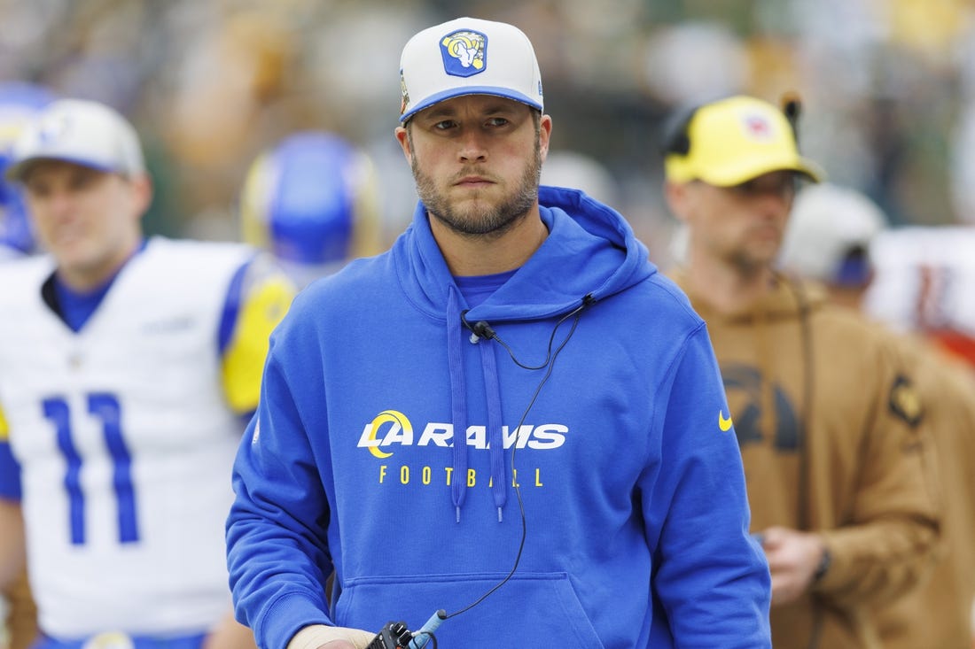 Nov 5, 2023; Green Bay, Wisconsin, USA;  Los Angeles Rams quarterback Matthew Stafford looks on from the sidelines prior to the game against the Green Bay Packers at Lambeau Field. Mandatory Credit: Jeff Hanisch-USA TODAY Sports