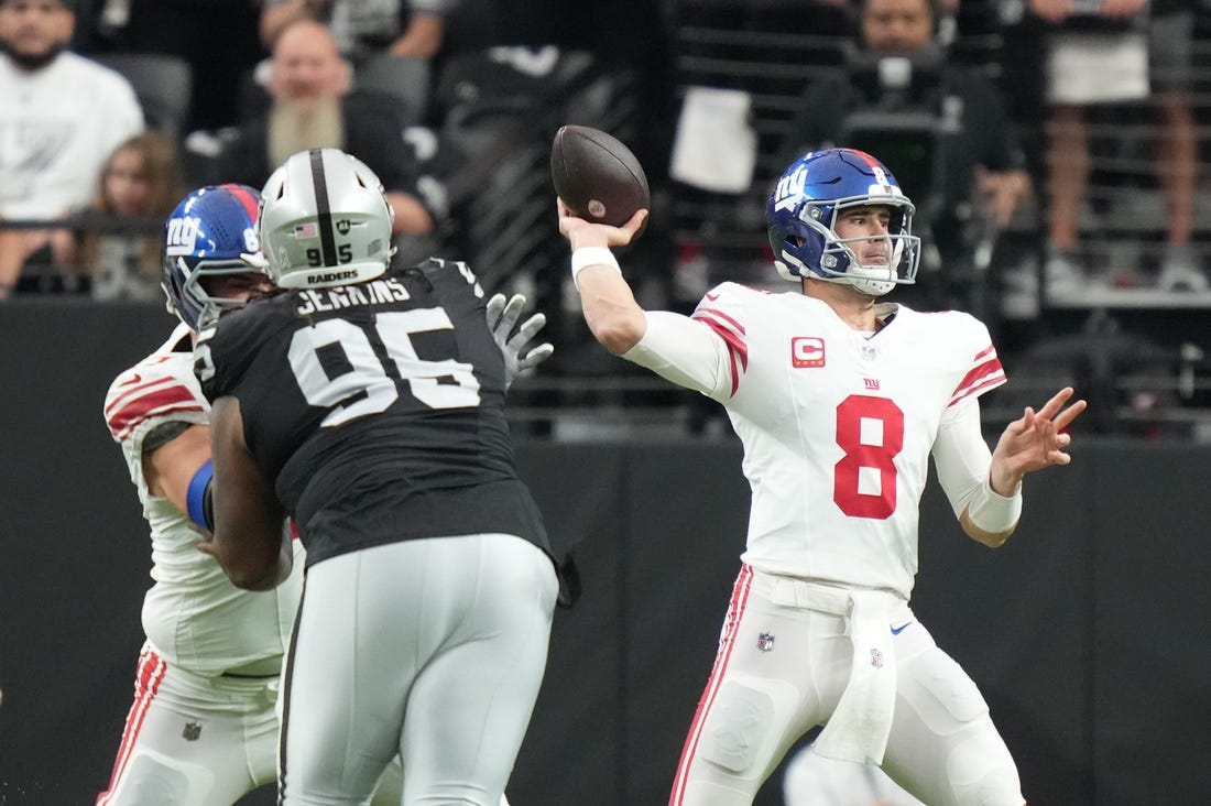 November 5, 2023; Paradise, Nevada, USA; New York Giants quarterback Daniel Jones (8) passes the football against the Las Vegas Raiders during the first quarter at Allegiant Stadium. Mandatory Credit: Kyle Terada-USA TODAY Sports