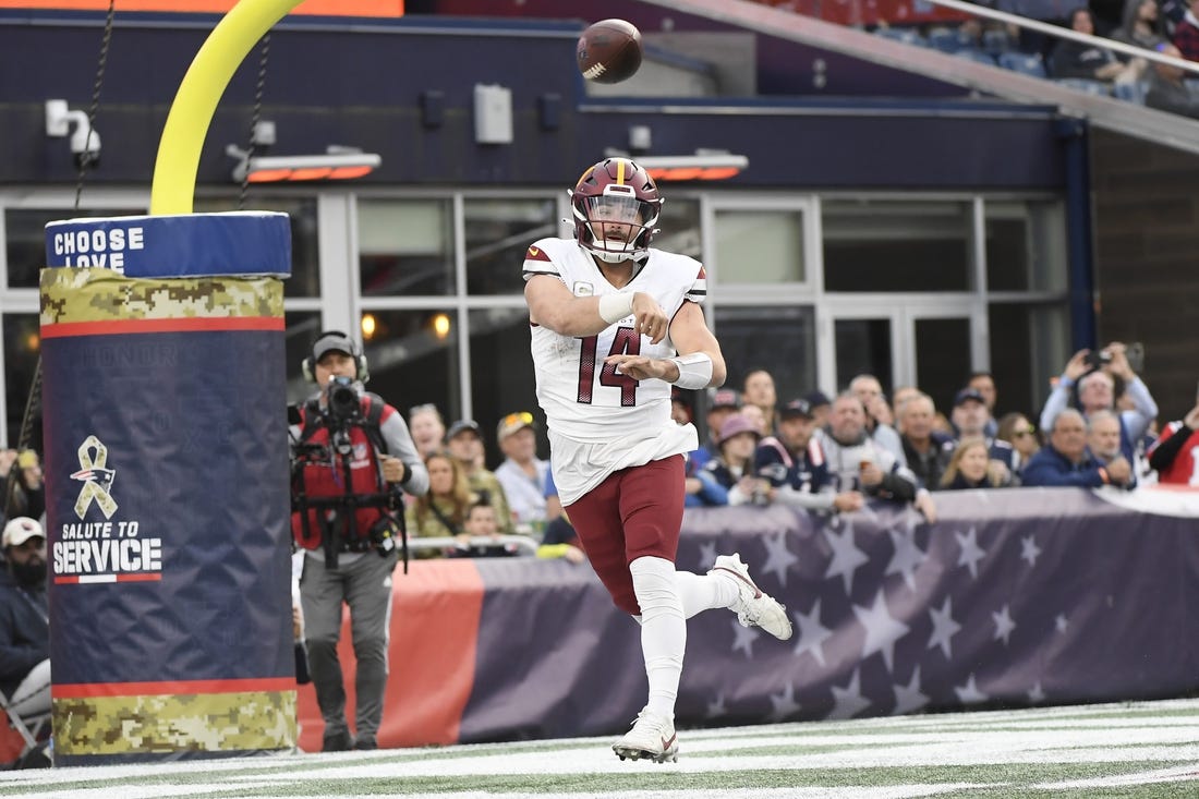 Nov 5, 2023; Foxborough, Massachusetts, USA;  Washington Commanders quarterback Sam Howell (14) throws the ball during the second half against the New England Patriots at Gillette Stadium. Mandatory Credit: Bob DeChiara-USA TODAY Sports