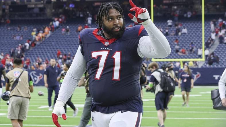 Nov 5, 2023; Houston, Texas, USA; Houston Texans offensive tackle Tytus Howard (71) walks off the field after the game against the Tampa Bay Buccaneers at NRG Stadium. Mandatory Credit: Troy Taormina-USA TODAY Sports