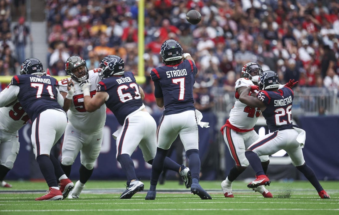 Nov 5, 2023; Houston, Texas, USA; Houston Texans quarterback C.J. Stroud (7) attempts a pass during the game against the Tampa Bay Buccaneers at NRG Stadium. Mandatory Credit: Troy Taormina-USA TODAY Sports