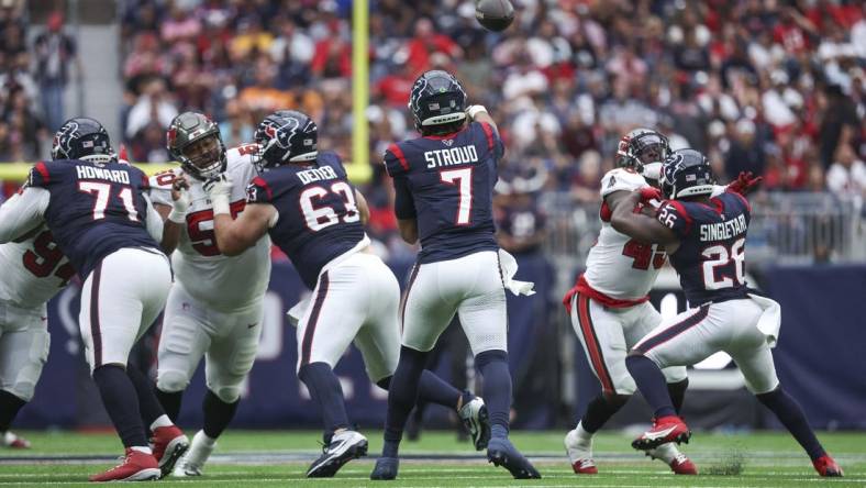 Nov 5, 2023; Houston, Texas, USA; Houston Texans quarterback C.J. Stroud (7) attempts a pass during the game against the Tampa Bay Buccaneers at NRG Stadium. Mandatory Credit: Troy Taormina-USA TODAY Sports